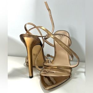JLO bronze high heels